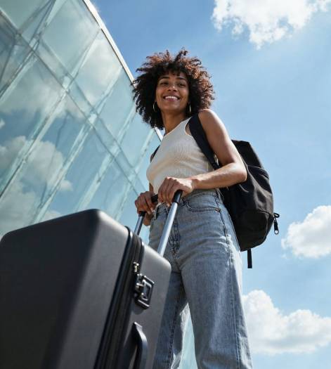 young-woman-traveling-with-suitcase